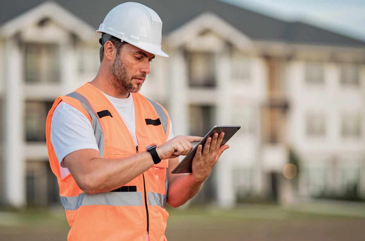 A contractor signing up and setting up their new company on a laptop