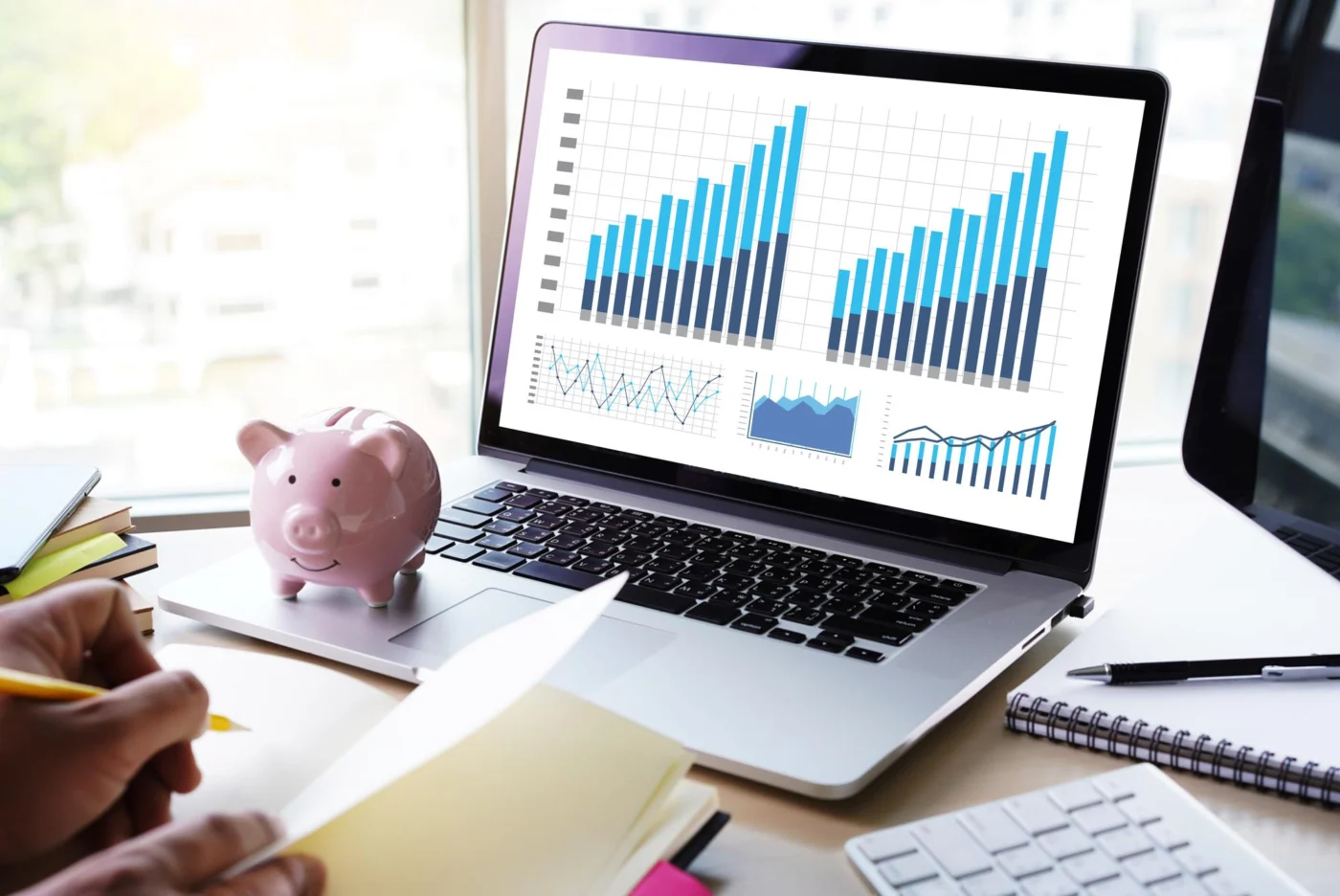 A retirement savings forecast shown on a laptop screen