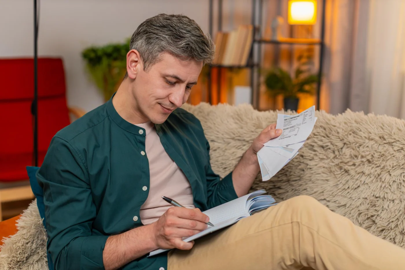 A director reviewing long-term retirement plans and notes at a desk