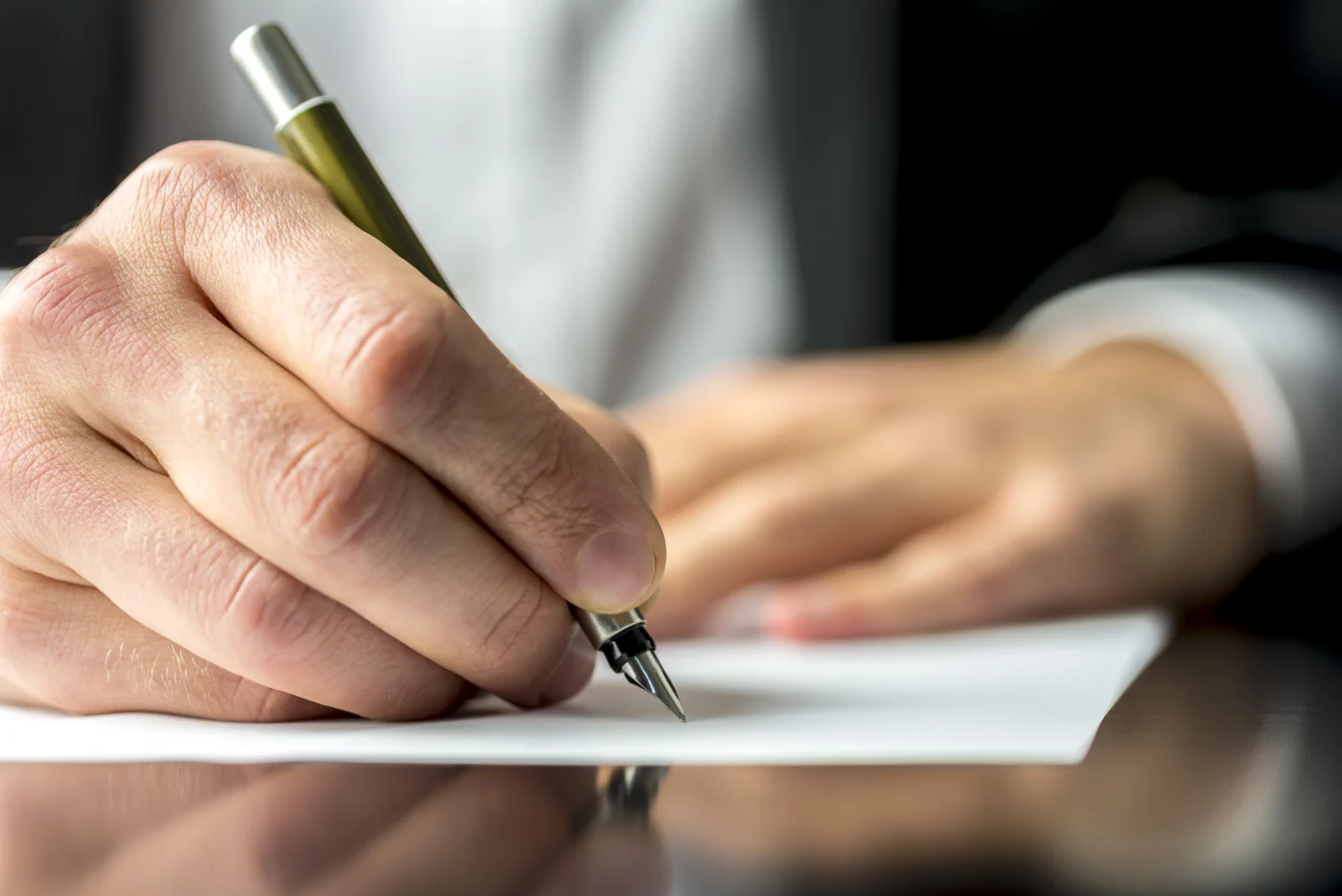 A director completing a Self Assessment return at a desk