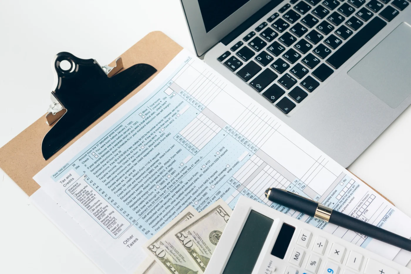 Businessman working in an office setting, representing tax compliance